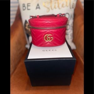 GUCCI
Calfskin Matelasse Mini GG Marmont Round Backpack RED